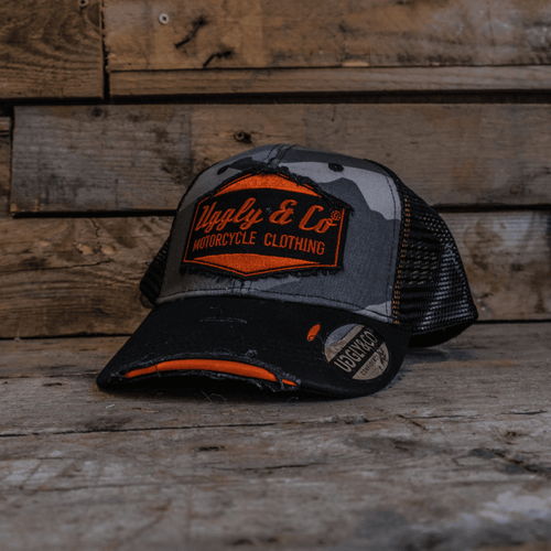 Grey camo diamond trucker cap by Uggly and Co featuring mesh back and structured front panel.
