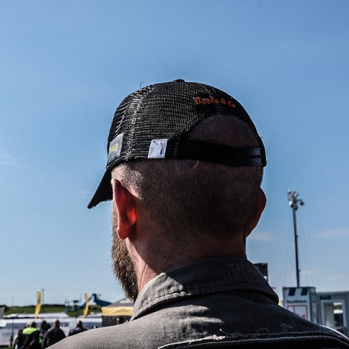 Grey camo diamond trucker hat by Uggly and Co featuring a classic mesh back and curved brim.