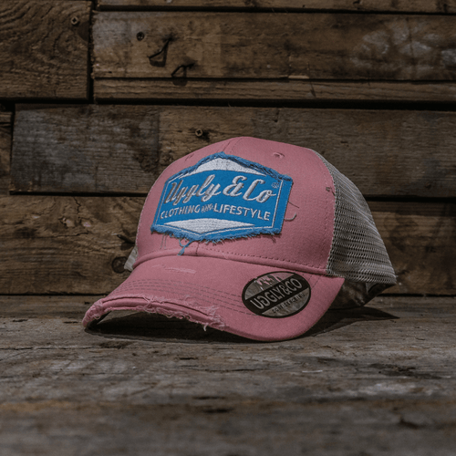 Pastel pink and blue diamond trucker cap by Uggly and Co with classic mesh back and adjustable strap.