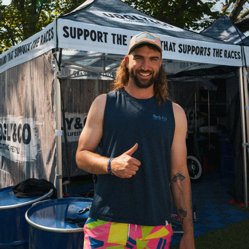 Pastel pink and blue diamond trucker cap by Uggly and Co, featuring a classic mesh trucker hat design with colorful diamond patterns.