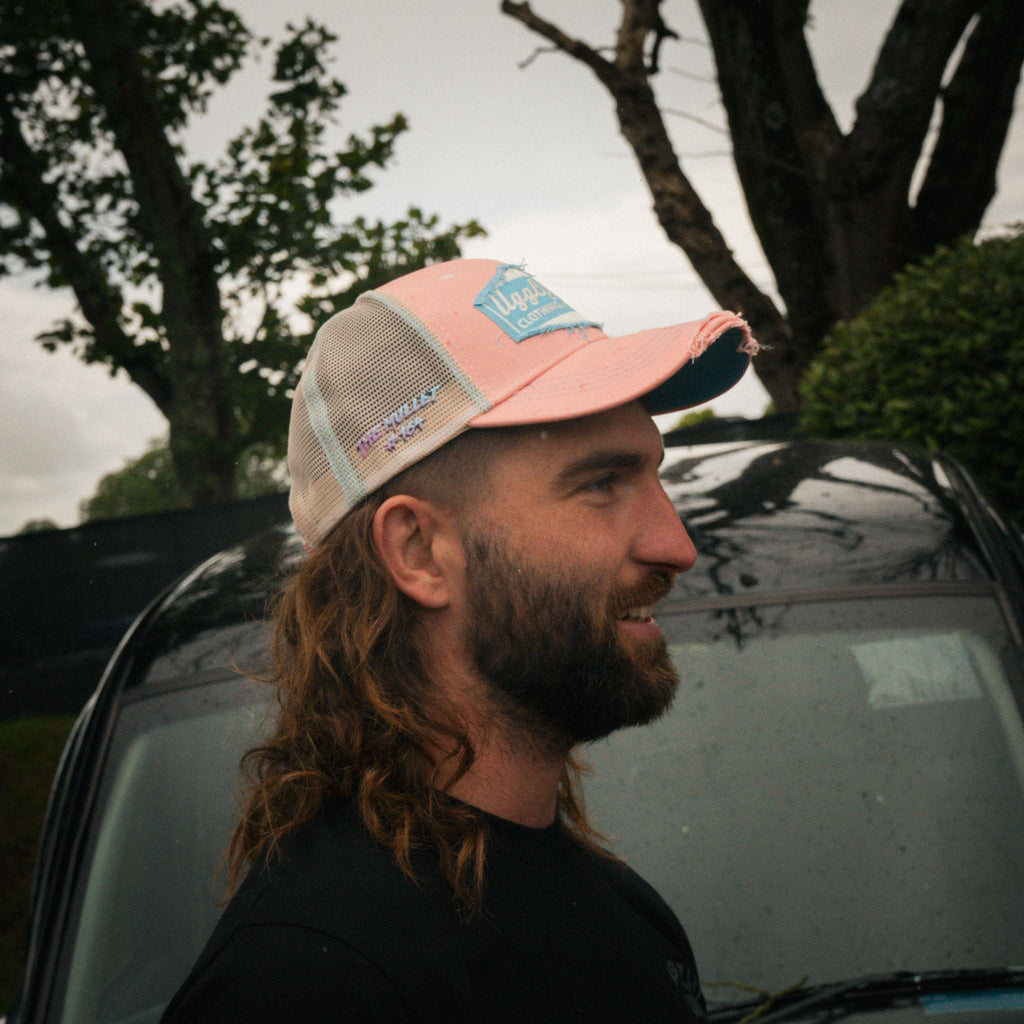 Pastel pink and blue diamond trucker cap by Uggly and Co featuring breathable mesh and adjustable snapback closure.