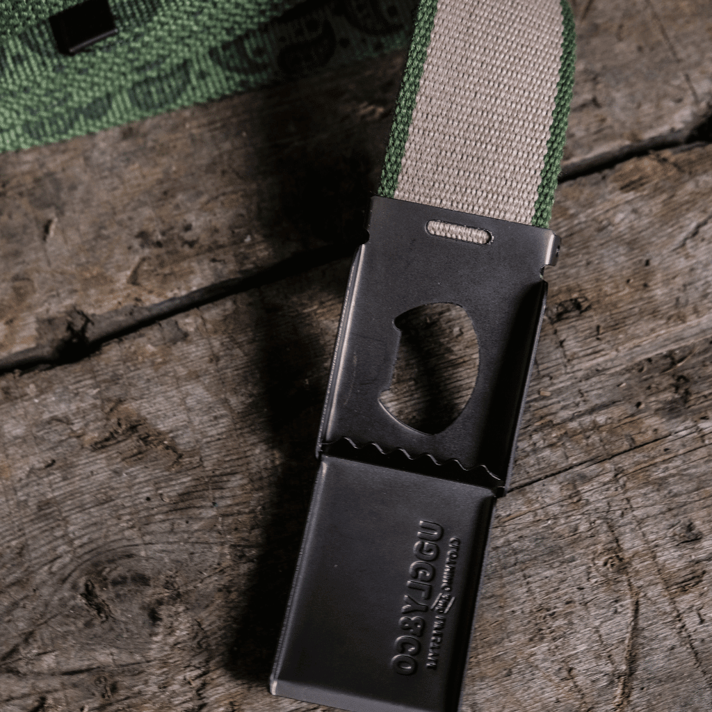 Green canvas utility belt from Uggly and Co with multiple pouches and adjustable strap for workwear accessories.