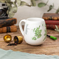 Trouvaille UK Explorer Colour-In Mug featuring a map of national parks and heritage sites, perfect for coloring and travel enthusiasts.