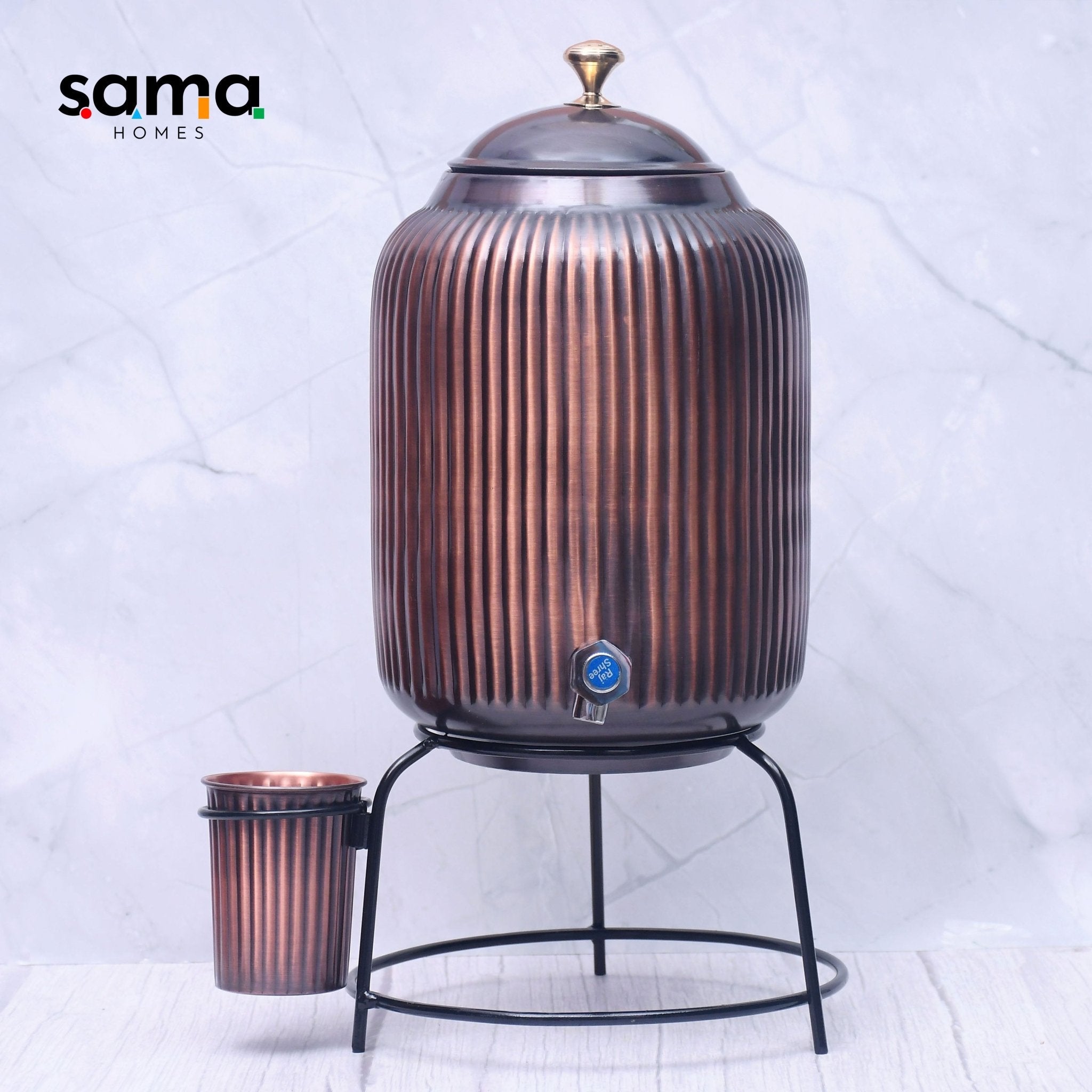 Handcrafted pure copper water dispenser with antique rope design, 5L/8L, featuring glass and stand by SAMA Homes.