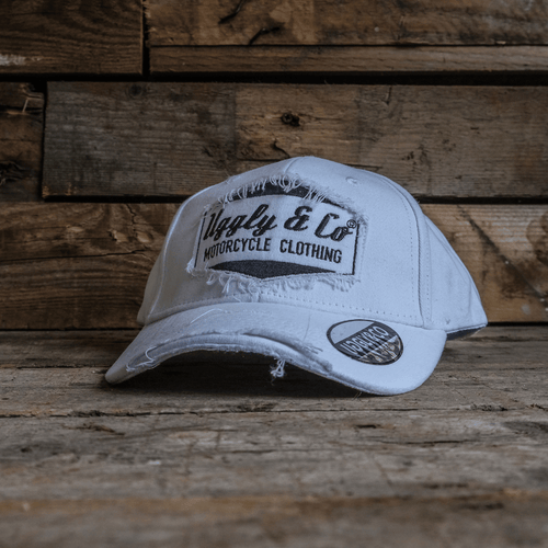 White diamond vintage baseball cap by Uggly and Co featuring a classic design and adjustable strap.