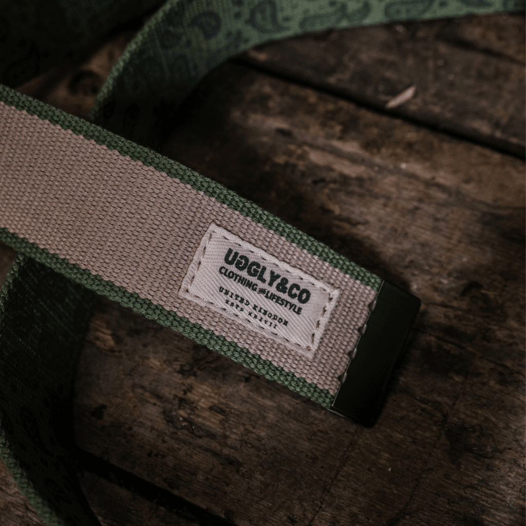 Green canvas utility belt from Uggly and Co featuring multiple pouches for workwear or casual use.