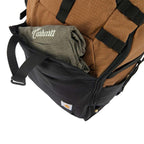 Black Carhartt 45L nylon frame hiking backpack with multiple compartments and sturdy straps, designed for outdoor adventure.