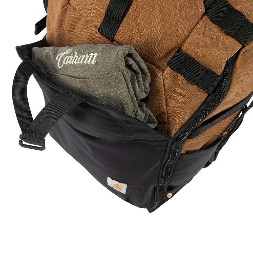 Black Carhartt 45L nylon frame hiking backpack with multiple compartments and sturdy straps, designed for outdoor adventure.