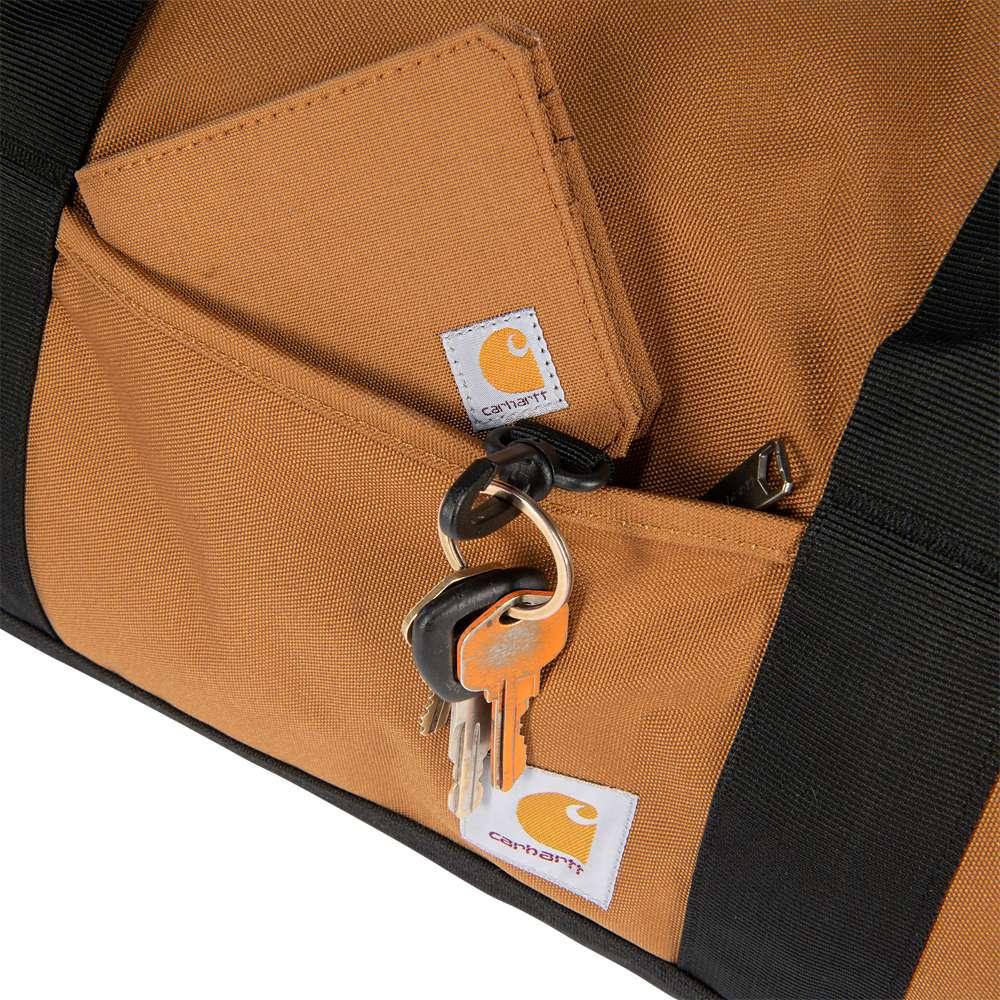 Black Carhartt 40L Classic Round Duffel Bag by Workwear Nation Ltd, durable toolcarrier with spacious storage and sturdy handles.