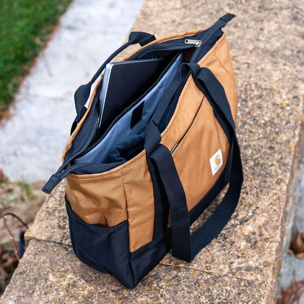Black Carhartt Classic Laptop Tote from Workwear Nation Ltd, durable tool carrier with multiple compartments for laptops and tools.