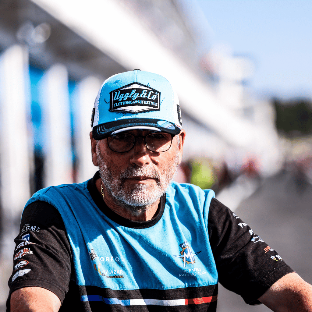 Uggly and Co diamond trucker hat featuring MV Agusta Team logo, with a bold design and curved brim on a mesh cap.